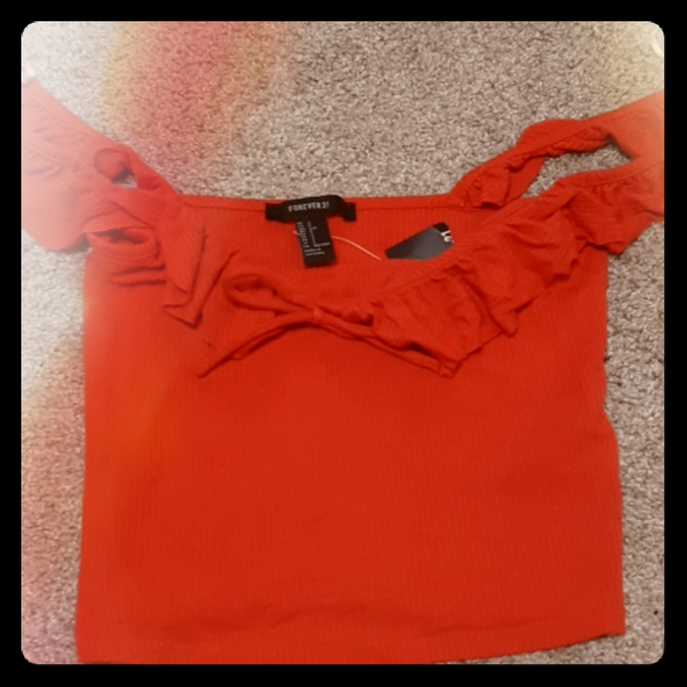 Orange colored ribbed crop top